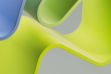Abstrakte former som er gul, blå og grønn